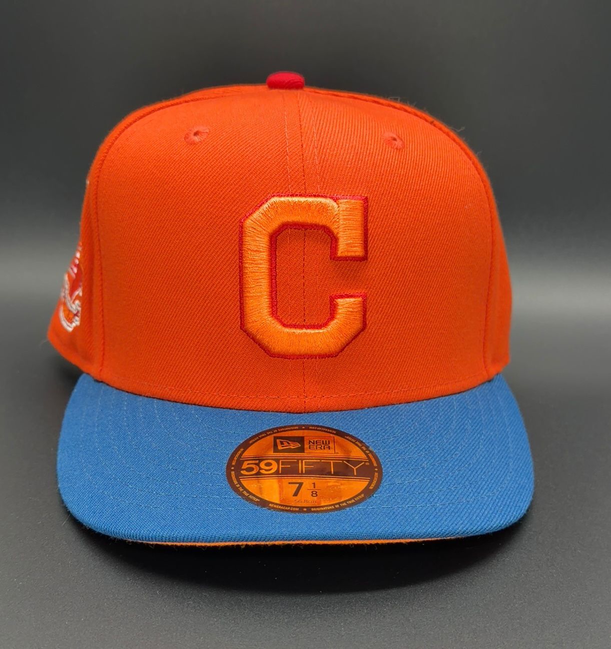 New Era 59FIFTY fitted Cleveland Indians shoes with Jacobs Field patch in orange and blue.