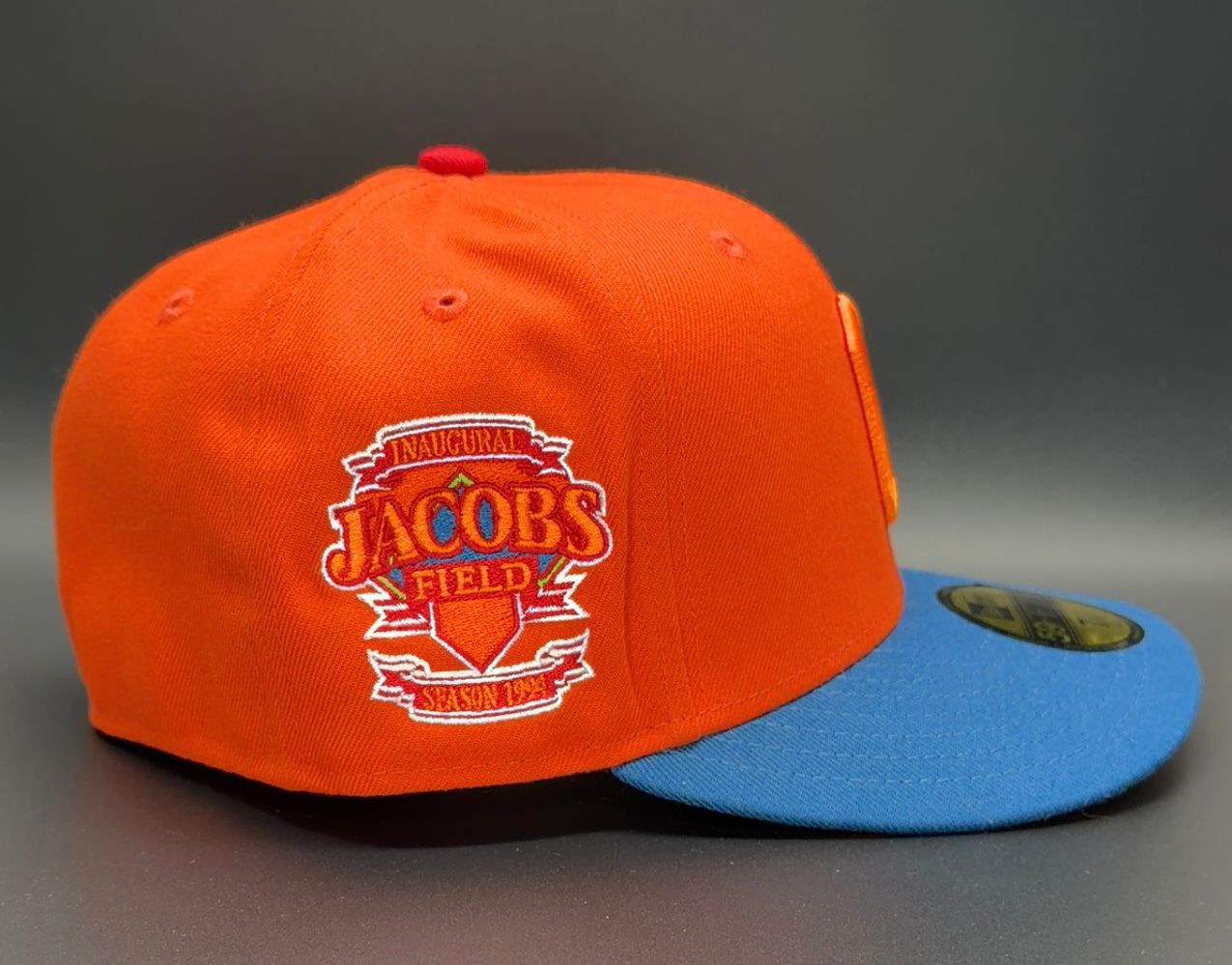 New Era 59FIFTY fitted Cleveland Indians shoes with Jacobs Field patch in orange and blue.