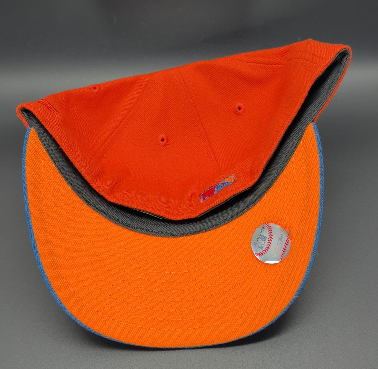 New Era 59FIFTY fitted Cleveland Indians shoes with Jacobs Field patch in orange and blue.